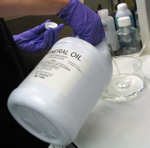 Pooring Mineral Oil